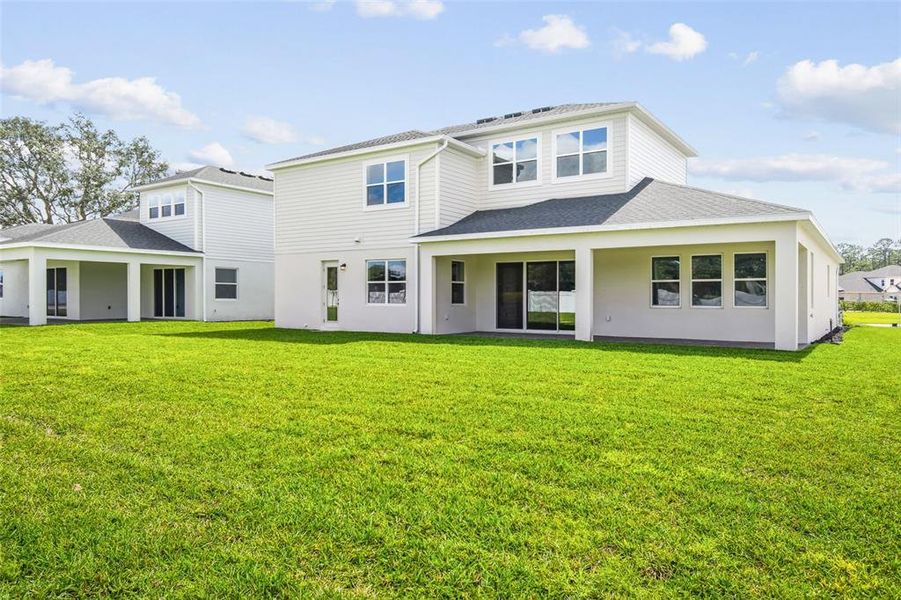 Exterior details and patio area of a home in Solace at Corner Lake, Orlando (Image 3).
