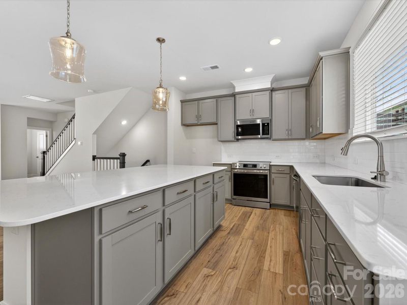 Furnished interior view inside a new home in Central Living at Craig, Charlotte (Image 10).