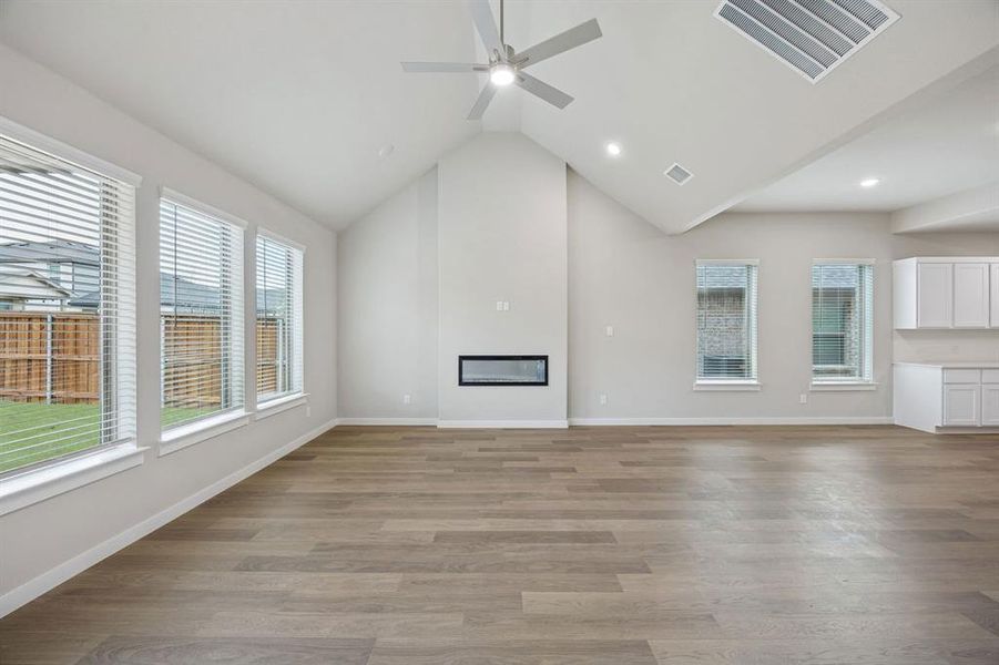 Living Room in the Stanley II home plan by Trophy Signature Homes – REPRESENTATIVE PHOTO