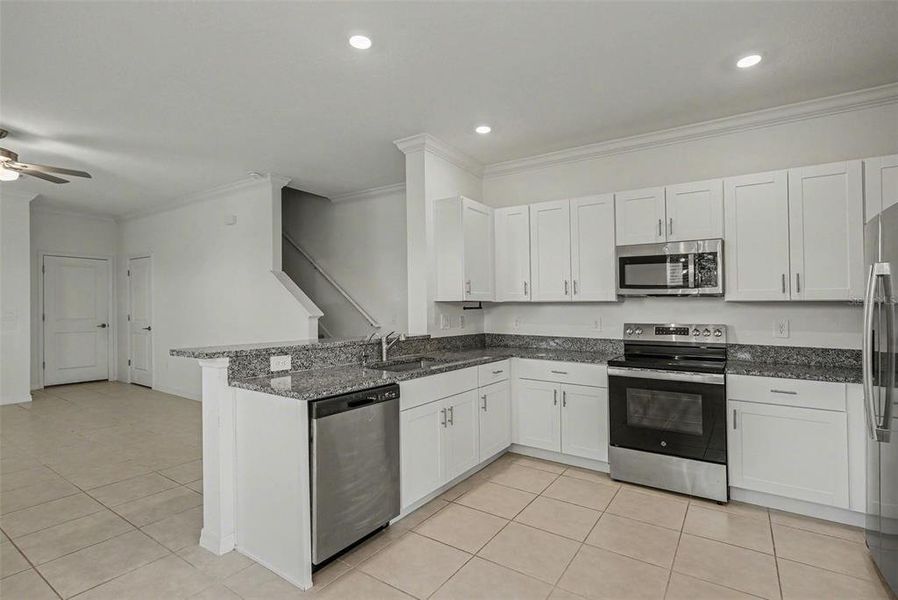 Furnished interior view inside a new home in , Zephyrhills (Image 8).