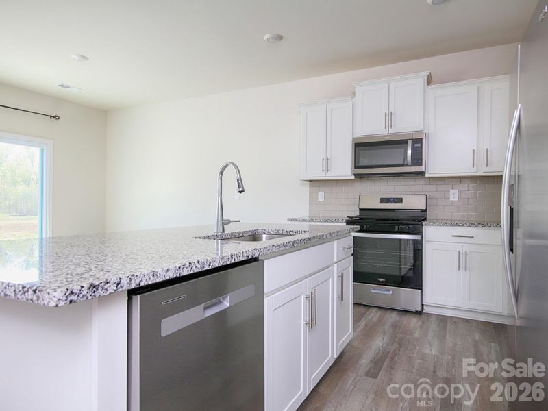 Furnished interior view inside a new home in Villas at Sherrills Ford, Terrell (Image 7).