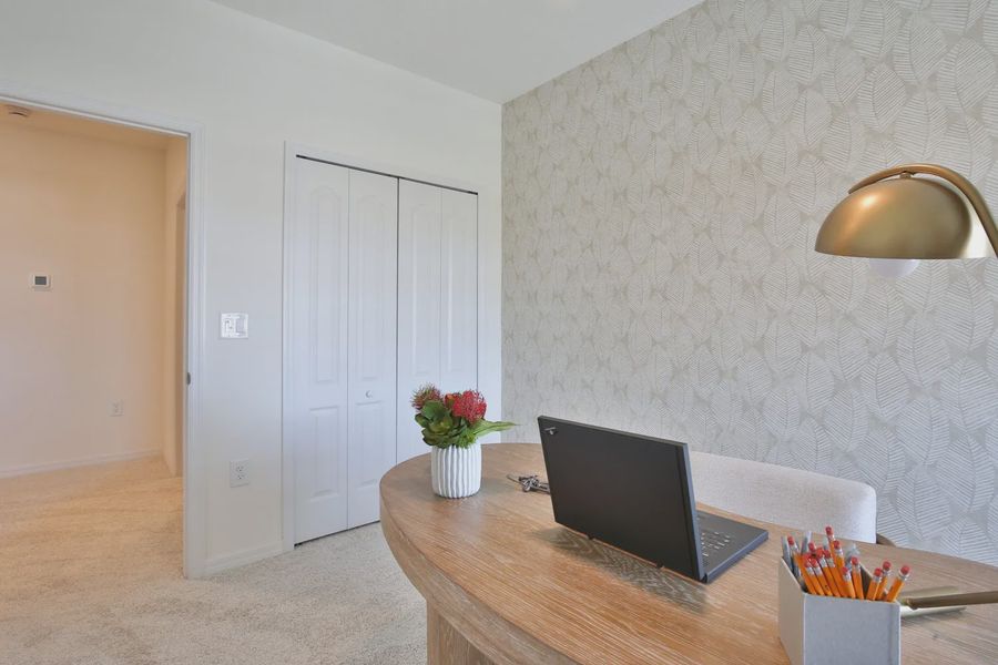 Representative furnished interior of a home built from the Morgan by Neal Communities in SkySail, Naples (Image 7).