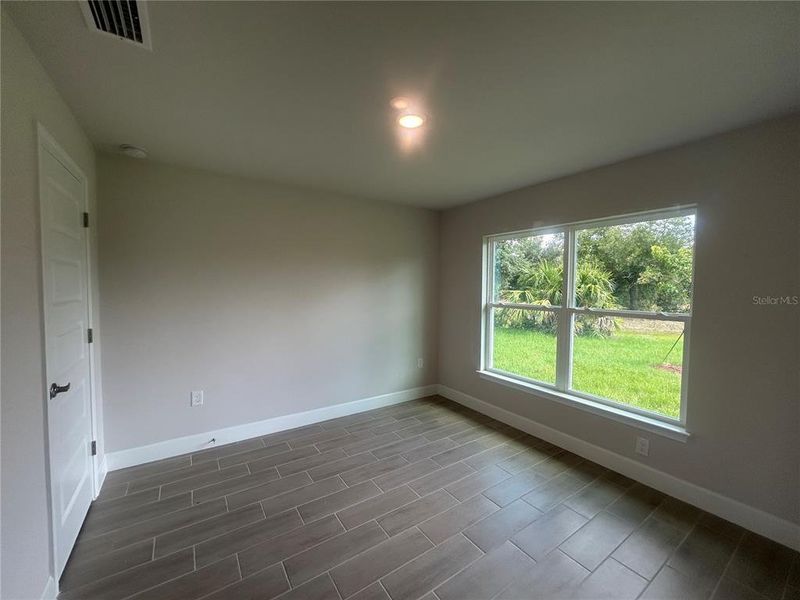 Spacious, unfurnished interior of a new home in Deep Creek, Punta Gorda (Image 18).
