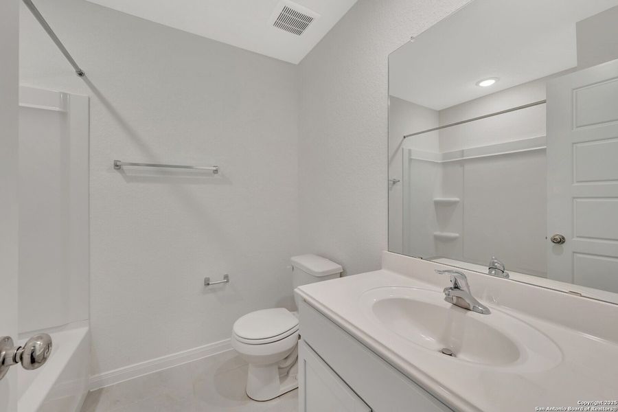 Furnished interior view inside a new home in Greenspoint Heights, Seguin (Image 8).