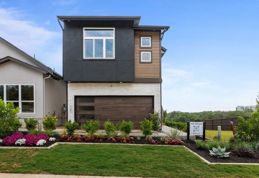 Representative exterior photo of a completed home built from the Apollo by Chesmar Homes in Centero at Stone Oak, San Antonio, TX (Image 19).