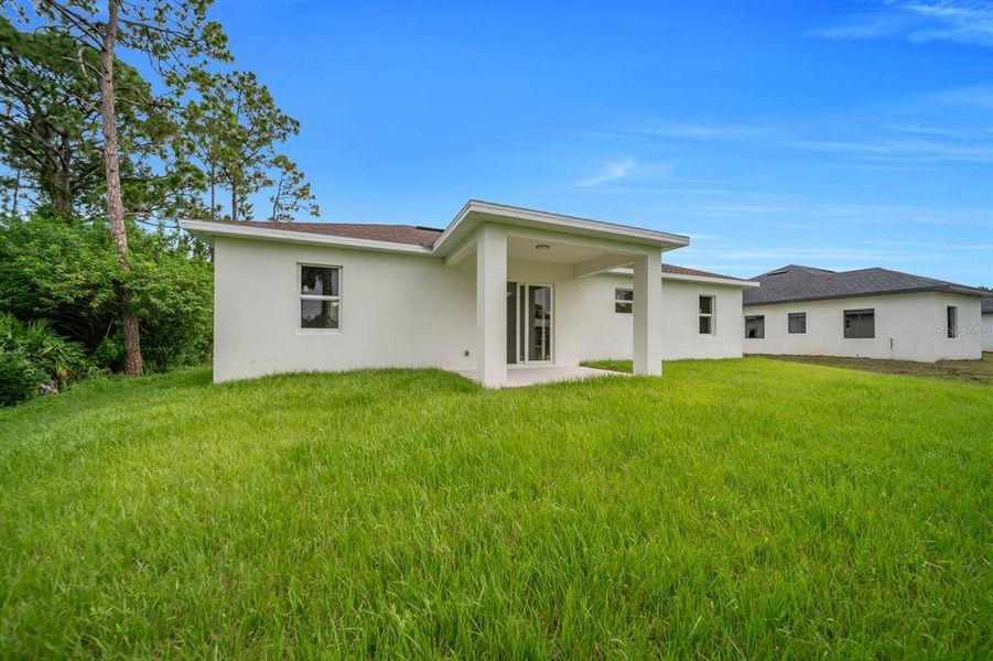 Exterior details and patio area of a home in , Lehigh Acres (Image 21).