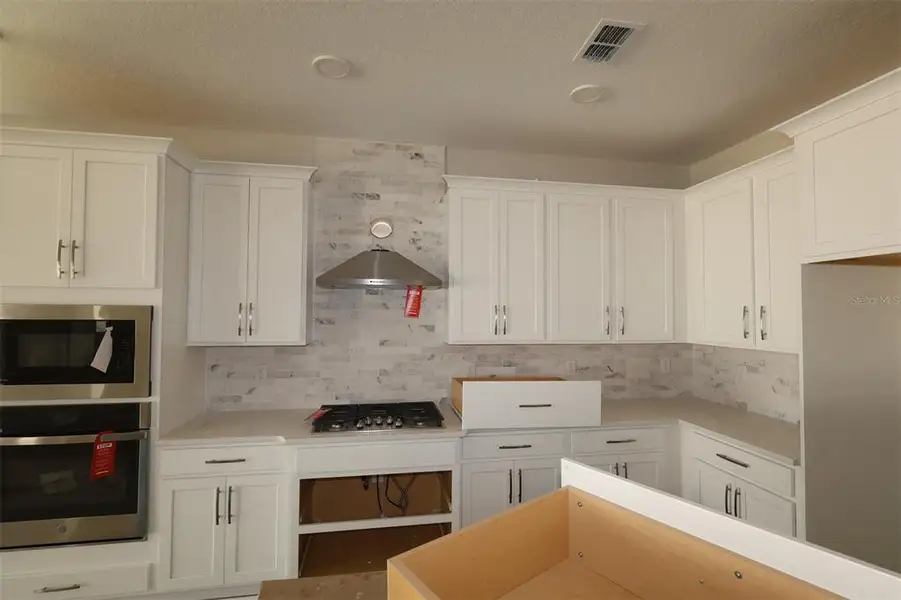 Furnished interior view inside a new home in Emerson Pointe, Apopka (Image 7).