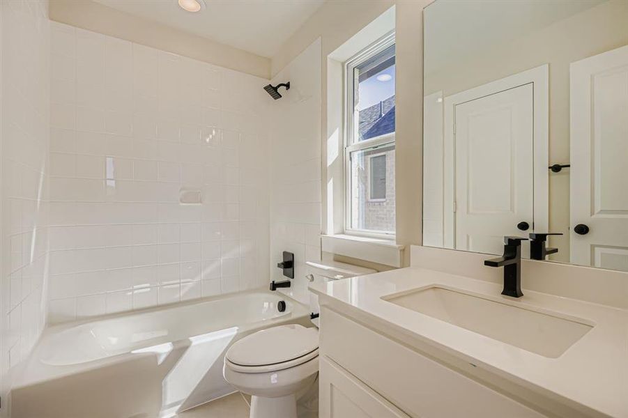 Full bathroom with vanity and bathtub / shower combination