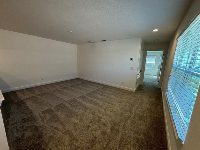 Spacious, unfurnished interior of a new home in Trinity Lakes, Groveland (Image 13).