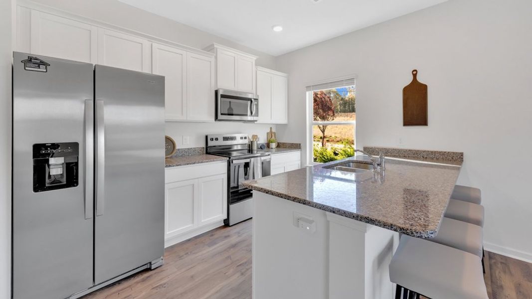 Representative furnished interior of a home built from the Altamont Townhome by D.R. Horton in Macon Townhomes, Seymour (Image 11).