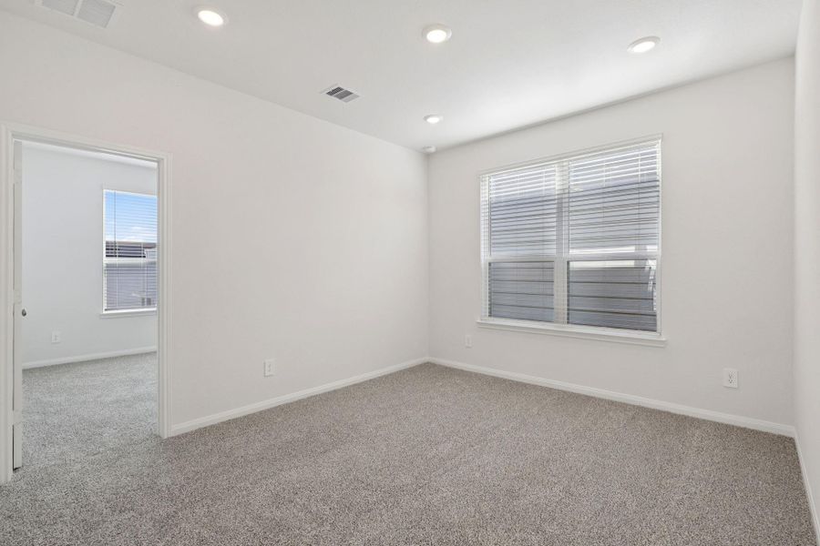 Spacious, unfurnished interior of a new home in Kemah Crossing - Luxe Series, Kemah (Image 25). Spacious, unfurnished interior of a new home in Kemah Crossing - Luxe Series, Kemah (Image 25).