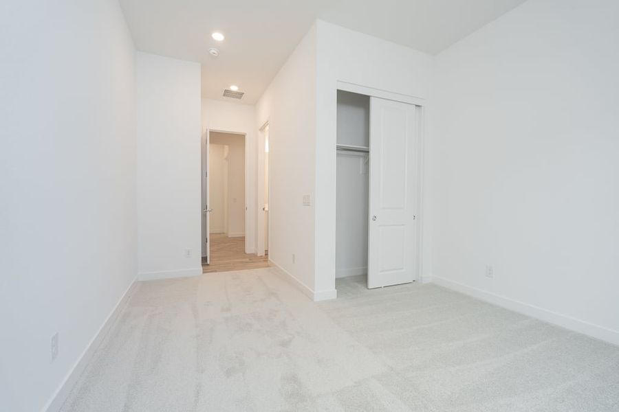 Spacious, unfurnished interior of a new home in Revana at Soleo, San Tan Valley (Image 29).