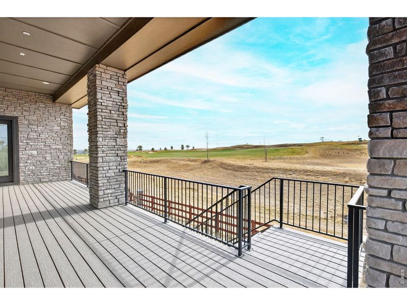 Exterior details and patio area of a home in RainDance, Windsor (Image 3).