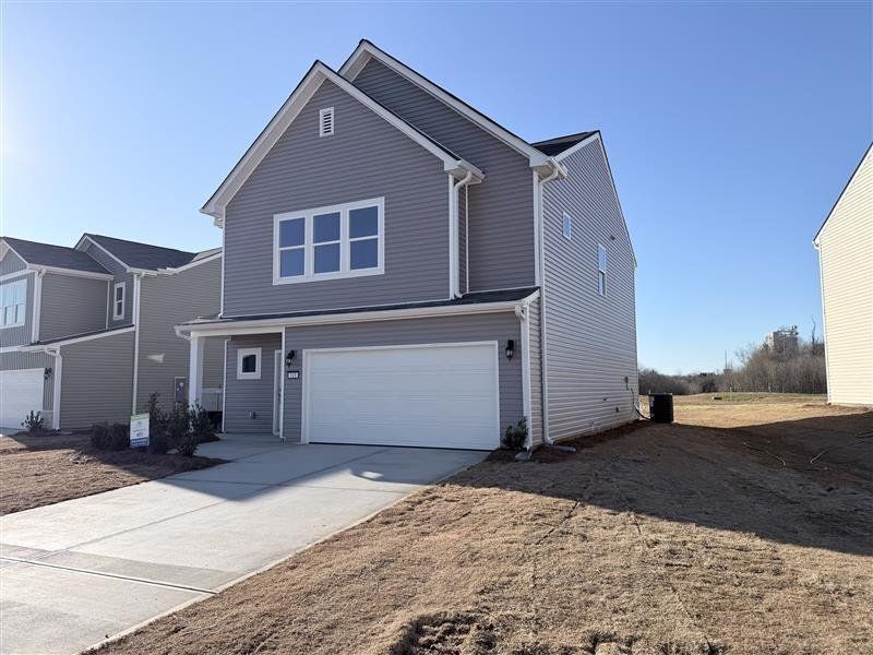 Front exterior of a new home in , Rockmart, GA, highlighting curb appeal (Image 12).