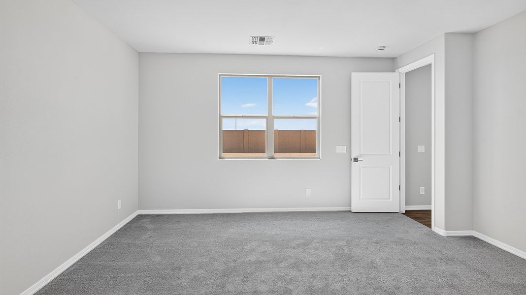 Spacious, unfurnished interior of a new home in Artisan at Asante, Surprise (Image 17).