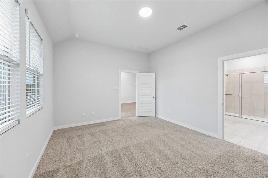 Primary Suite in the Cedar home plan by Trophy Signature Homes – REPRESENTATIVE PHOTO