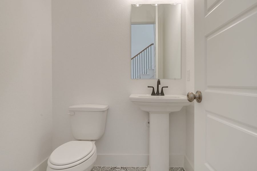 Representative furnished interior of a home built from the Longview by Graham Hart Home Builder in Bear Ridge, Burleson (Image 9).