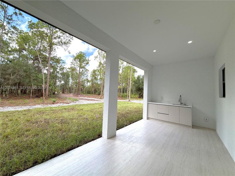 Exterior details and patio area of a home in , Naples (Image 3).