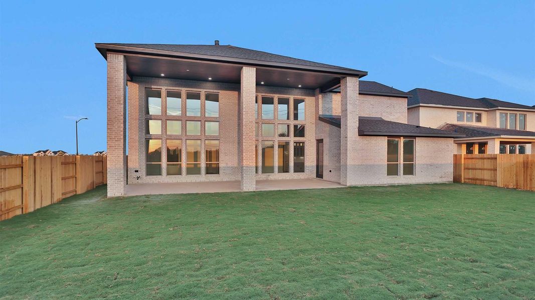 Exterior details and patio area of a home in Elyson 70', Katy (Image 3). Exterior details and patio area of a home in Elyson 70', Katy (Image 3).