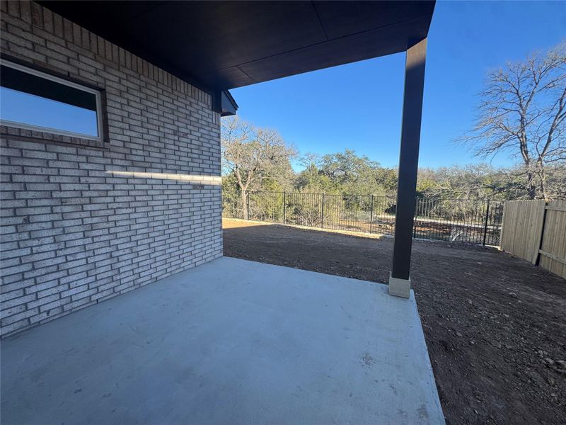 Exterior details and patio area of a home in Persimmon, Buda (Image 21).