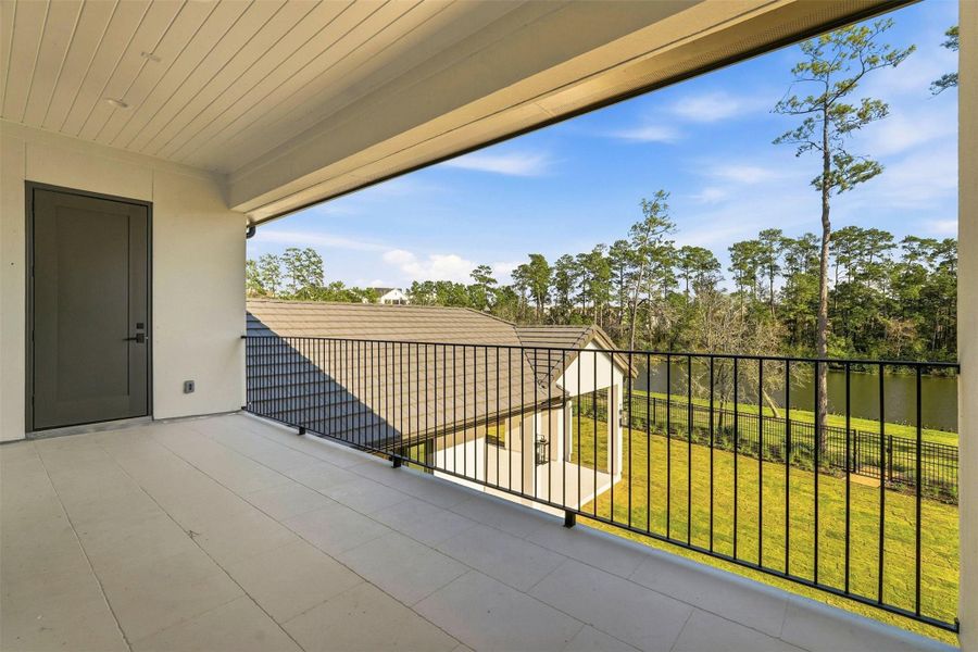 This second floor veranda is an idyllic retreat for relaxation, where the gentle sounds of the water and birdsong create a serene lakeside sanctuary. This second floor veranda is an idyllic retreat for relaxation, where the gentle sounds of the water and birdsong create a serene lakeside sanctuary.