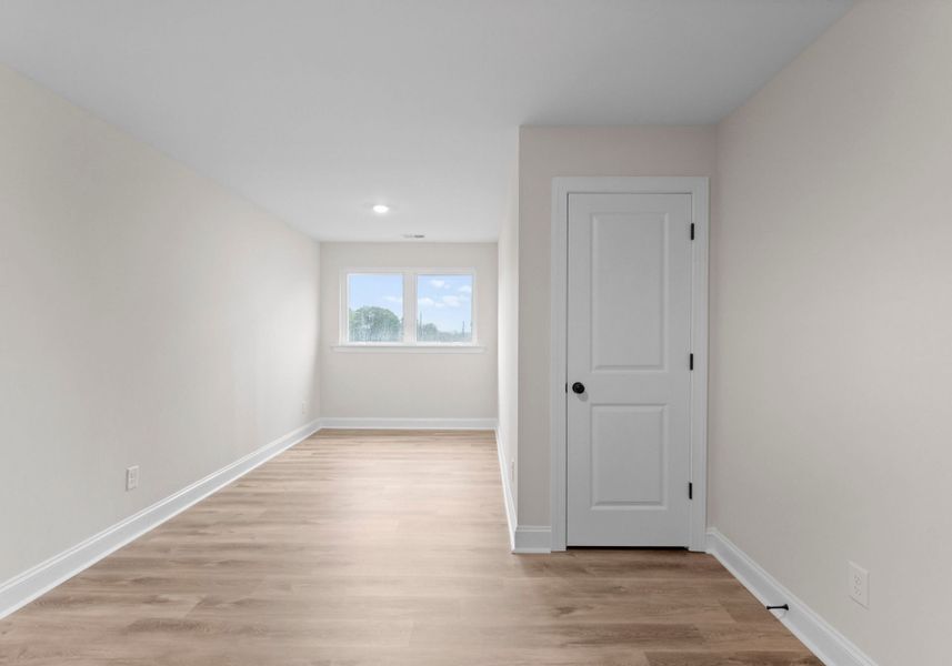 Spacious, unfurnished interior of a new home in Hartford Townhomes, Charlotte (Image 25).