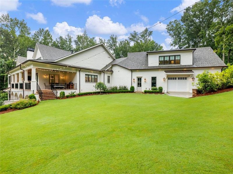 Front exterior of a new home in , Buford, GA, highlighting curb appeal (Image 34). Front exterior of a new home in , Buford, GA, highlighting curb appeal (Image 34).