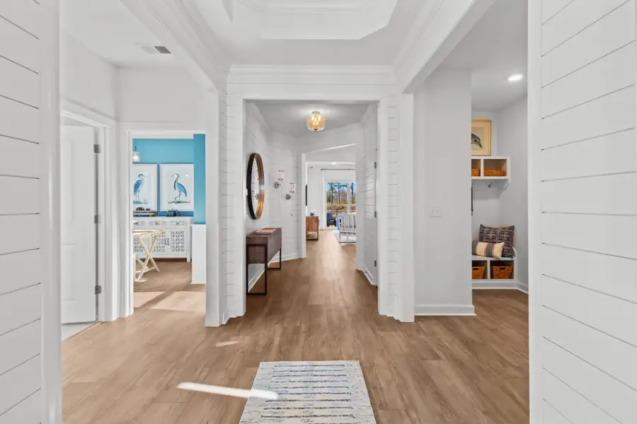 Representative furnished interior of a home built from the The Longboard by Chesapeake Homes in Coastal Club of the Carolinas, Calabash (Image 4).