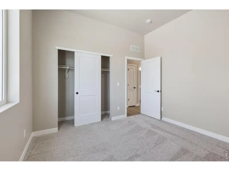 Spacious, unfurnished interior of a new home in Highlands Preserve, Mead (Image 19).