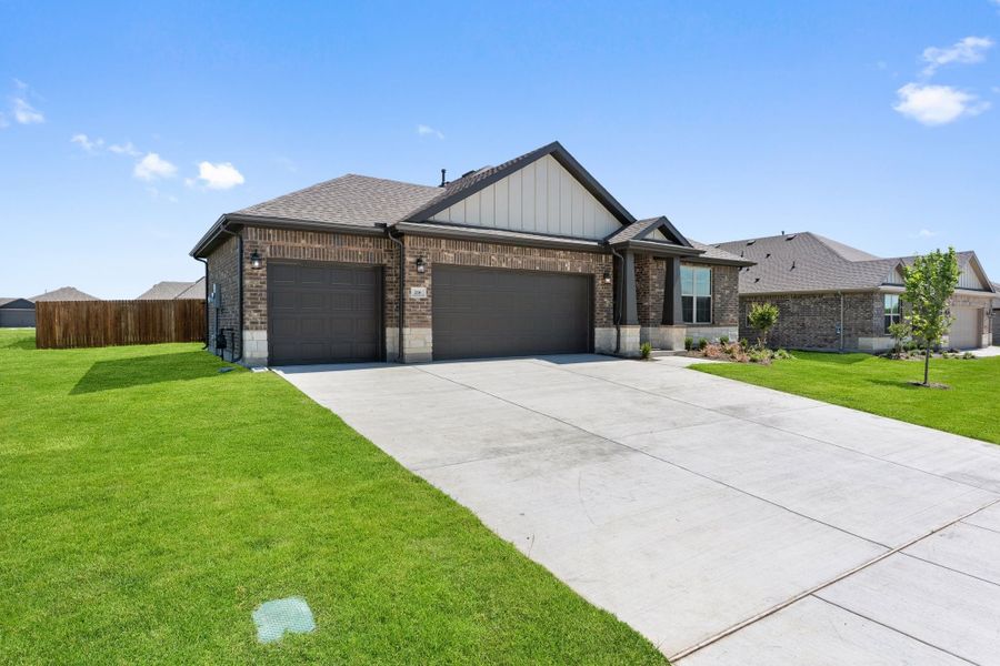 Front exterior of a new home in Waverly Estates, Nevada, TX, highlighting curb appeal (Image 52).