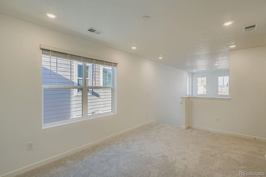 Spacious, unfurnished interior of a new home in Parterre: Paired Homes, Thornton (Image 10).