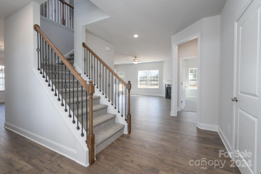 Foyer looking into Family Room. Photo representation. Colors and options will differ.