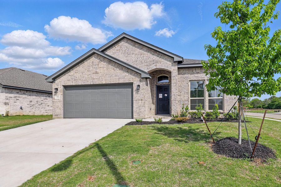 Representative exterior photo of a completed home built from the Devin by Cheldan Homes in Sunset Ridge, Keene, TX (Image 27). Representative exterior photo of a completed home built from the Devin by Cheldan Homes in Sunset Ridge, Keene, TX (Image 27).