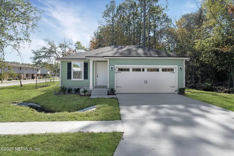 Front exterior of a new home in , Jacksonville, FL, highlighting curb appeal (Image 1). Front exterior of a new home in , Jacksonville, FL, highlighting curb appeal (Image 1).