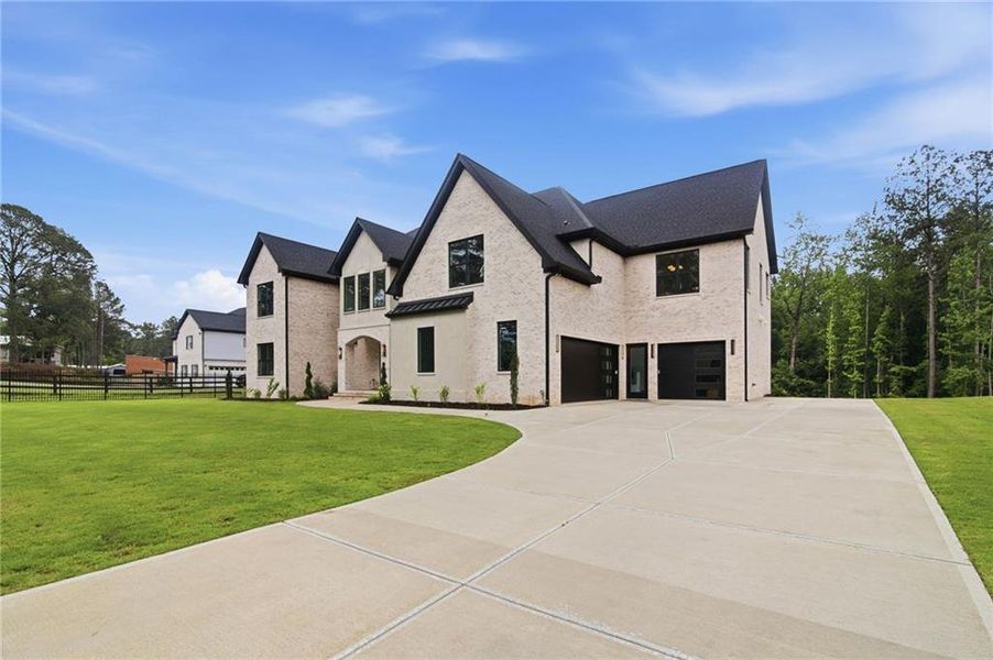 Front exterior of a new home in , Buford, GA, highlighting curb appeal (Image 24). Front exterior of a new home in , Buford, GA, highlighting curb appeal (Image 24).