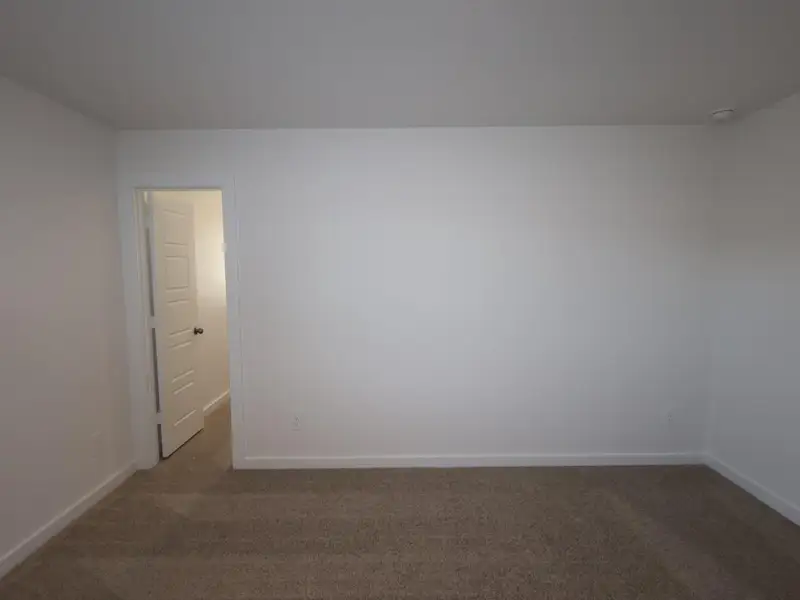 Spacious, unfurnished interior of a new home in Pinewood at Grand Texas, New Caney (Image 8).