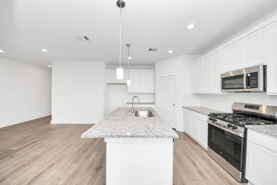 Furnished interior view inside a new home in The Canopies, Splendora (Image 3). Furnished interior view inside a new home in The Canopies, Splendora (Image 3).