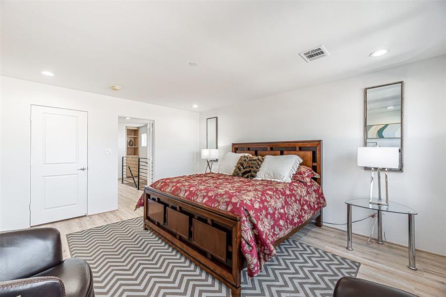 Primary Bedroom is large in size with an abundance of natural light