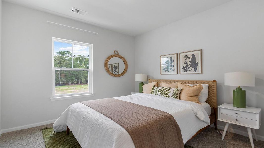 Furnished interior view inside a new home in The Crossing at St. James, Summerville (Image 11).