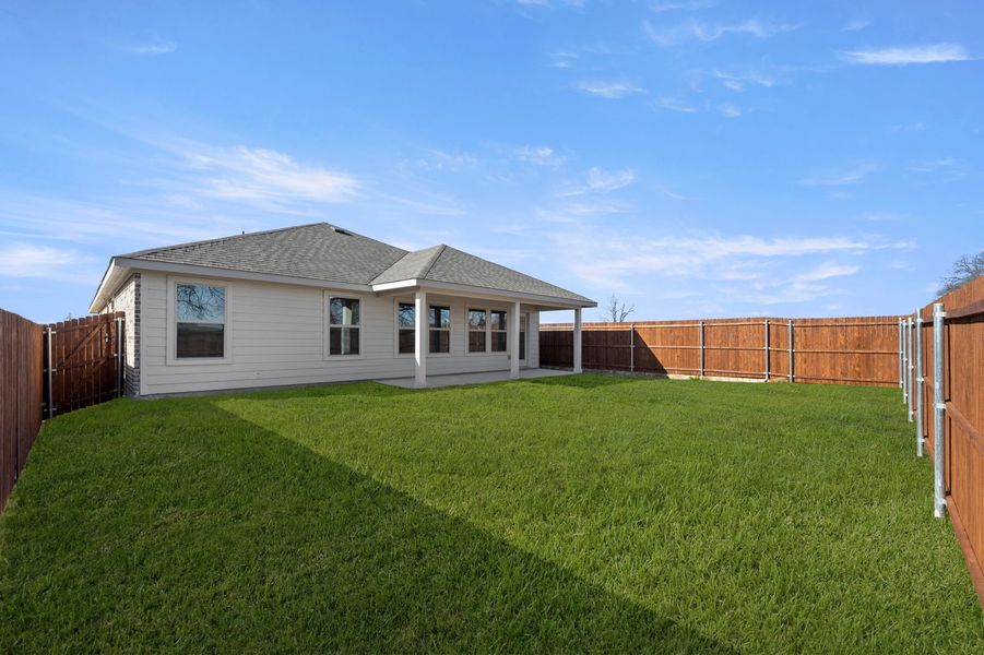 Front exterior of a new home in Belmont, Aubrey, TX, highlighting curb appeal (Image 27). Front exterior of a new home in Belmont, Aubrey, TX, highlighting curb appeal (Image 27).
