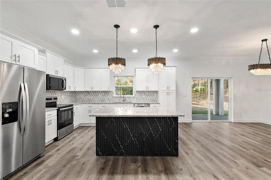 Furnished interior view inside a new home in , Dunnellon (Image 7).