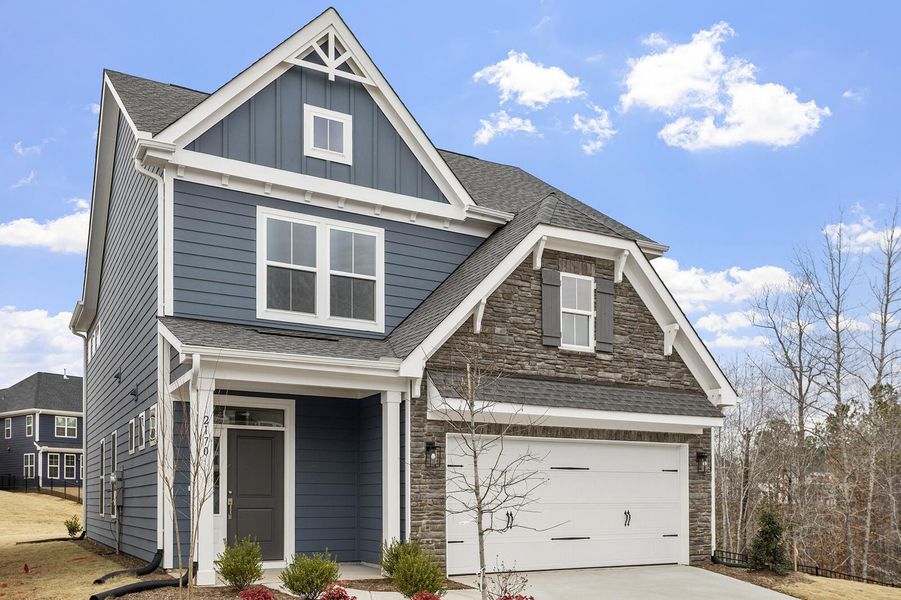 Front exterior of a new home in , Summerville, SC, highlighting curb appeal (Image 24).