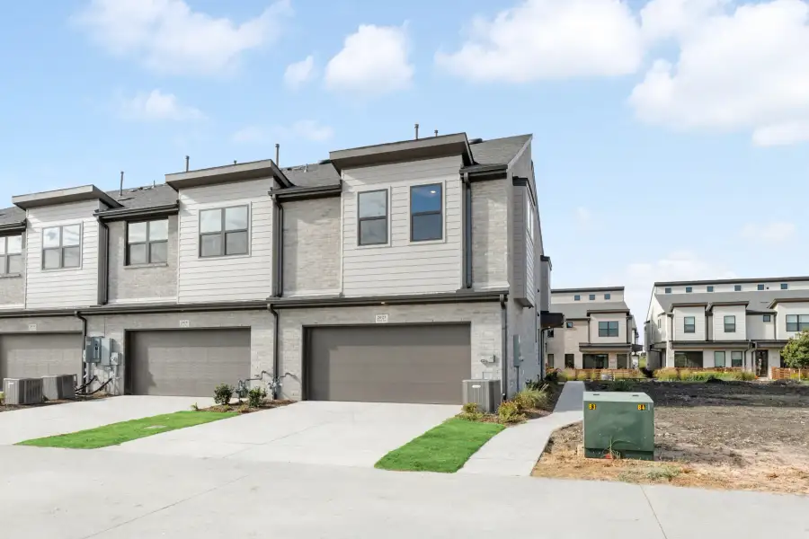 Front exterior of a new home in Ten Mile Creek, Celina, TX, highlighting curb appeal (Image 28).