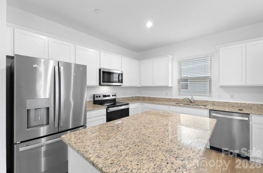 Furnished interior view inside a new home in Spring Meadow, Concord (Image 8).