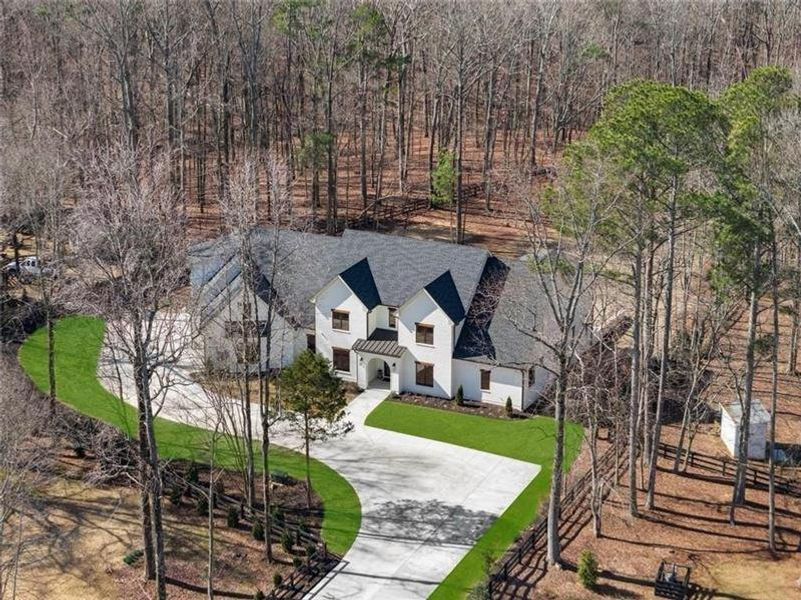 Front exterior of a new home in , Alpharetta, GA, highlighting curb appeal (Image 24). Front exterior of a new home in , Alpharetta, GA, highlighting curb appeal (Image 24).