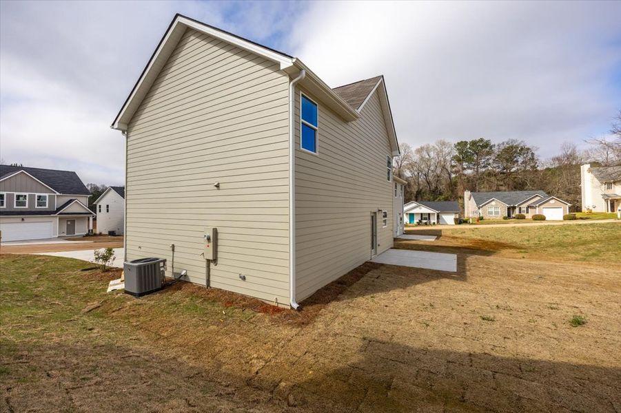 Exterior details and patio area of a home in Creekside Manor, Thomaston (Image 3).