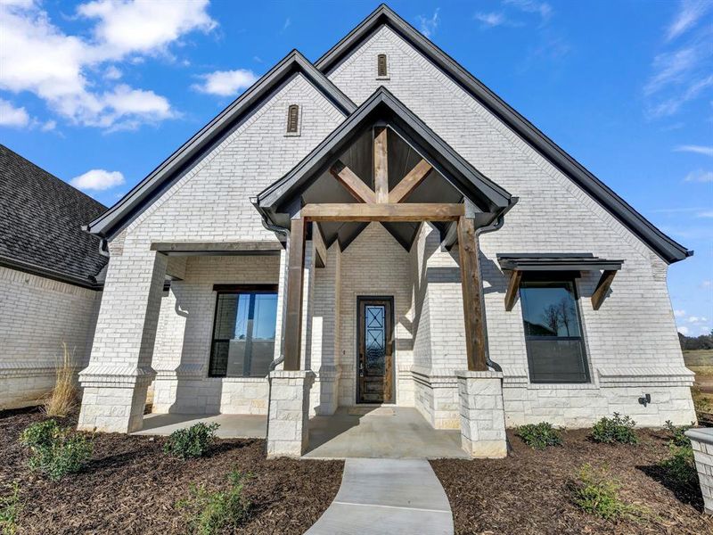 Front exterior of a new home in , Weatherford, TX, highlighting curb appeal (Image 27). Front exterior of a new home in , Weatherford, TX, highlighting curb appeal (Image 27).