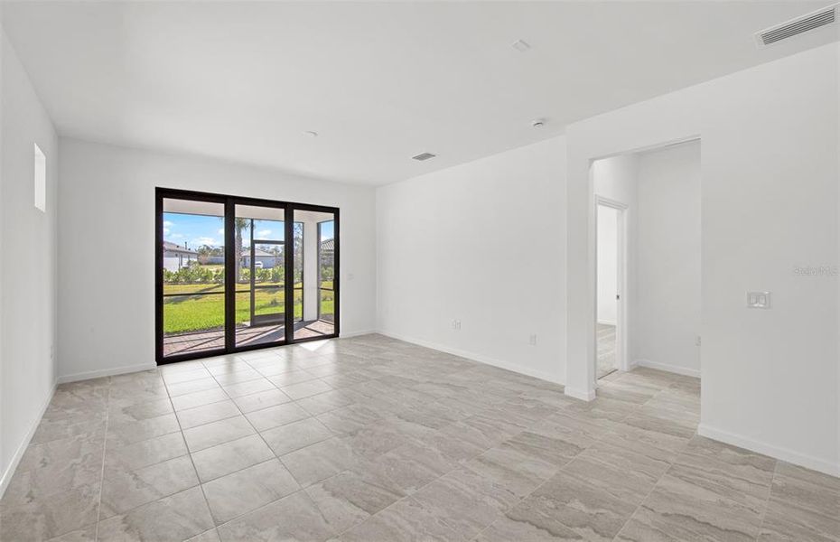 Spacious, unfurnished interior of a new home in Arbor Oaks, North Port (Image 18). Spacious, unfurnished interior of a new home in Arbor Oaks, North Port (Image 18).