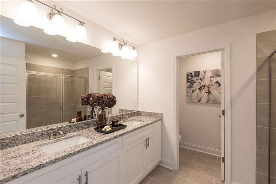 Furnished interior view inside a new home in Towns at Enclave, Lawrenceville (Image 9). Furnished interior view inside a new home in Towns at Enclave, Lawrenceville (Image 9).