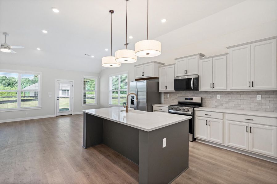 Furnished interior view inside a new home in Villages of Green Meadows, Munford (Image 7).